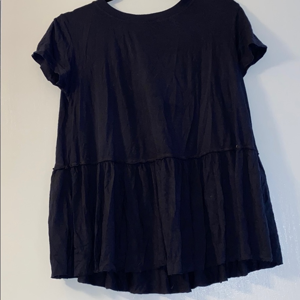 Loose and soft peplum tee.